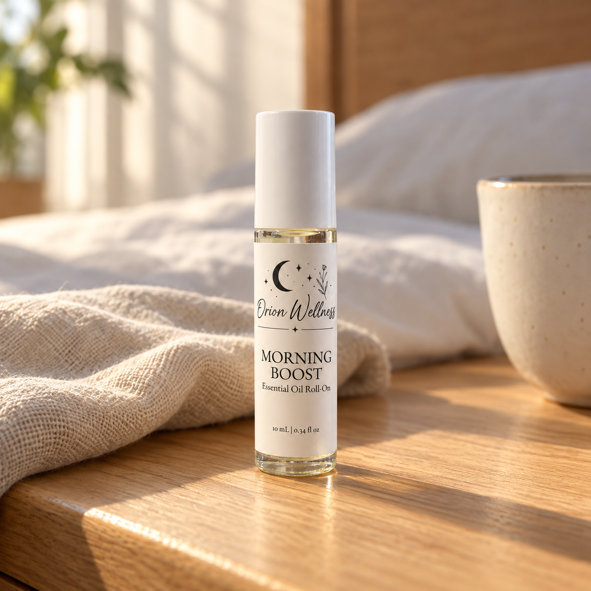 Orion Wellness Morning Boost 10 mL roll-on in a warm natural home setting