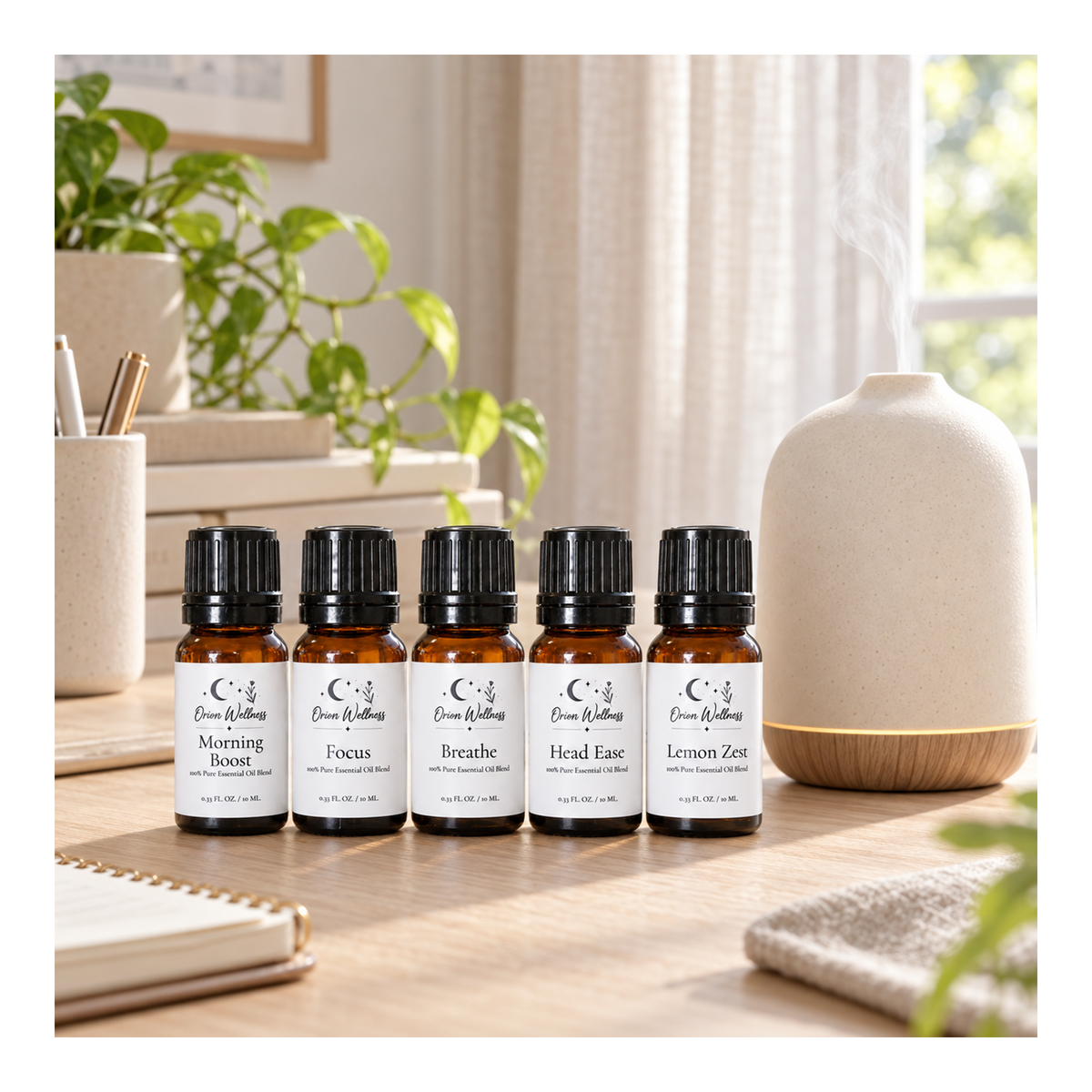 Orion Wellness daytime diffuser blend set beside a running diffuser