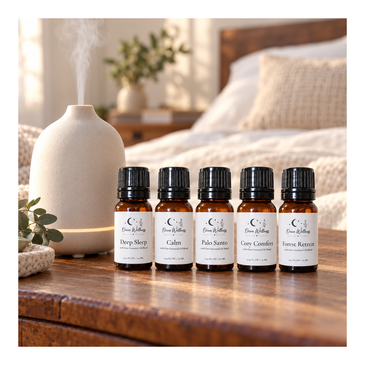 Orion Wellness evening diffuser blend set beside a running diffuser