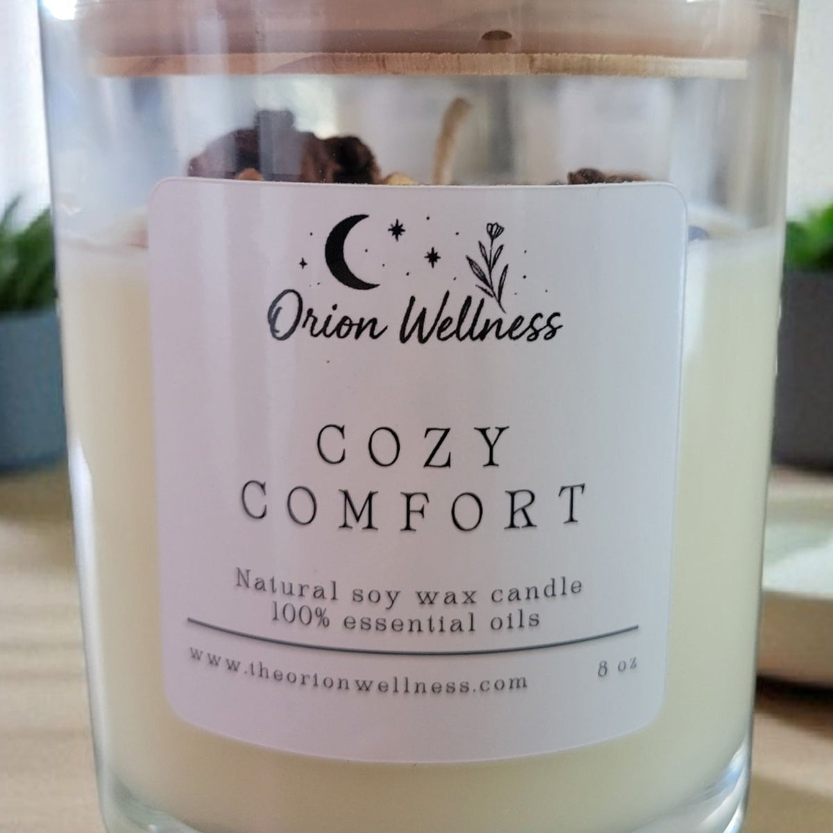 Close-up of Cozy Comfort Candle label by Orion Wellness