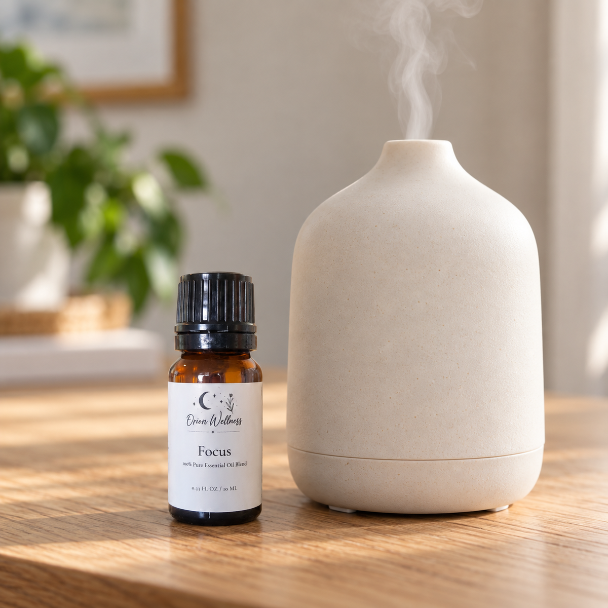 Orion Wellness Focus 10 mL diffuser blend beside a running diffuser