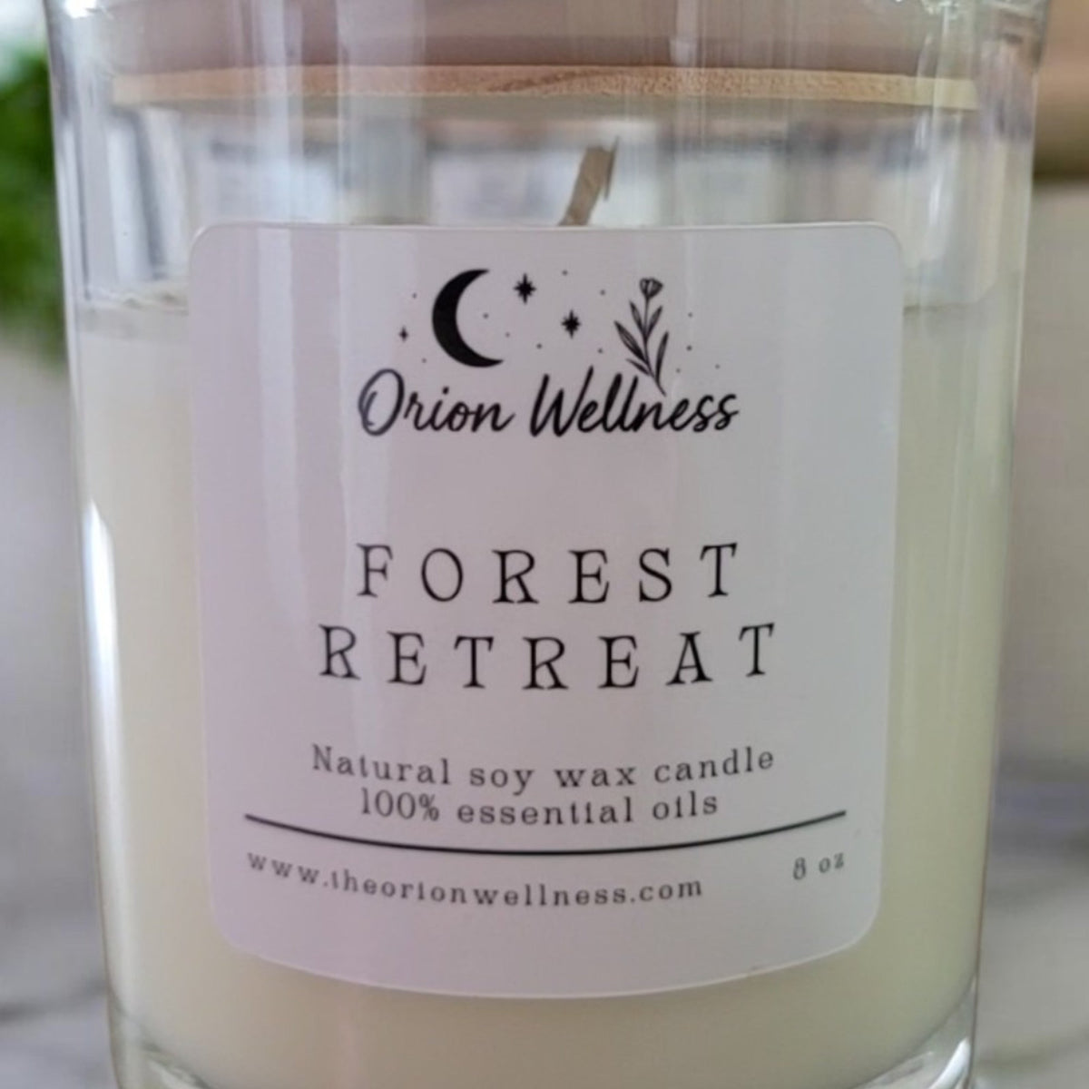 Close-up of Forest Retreat Candle label by Orion Wellness