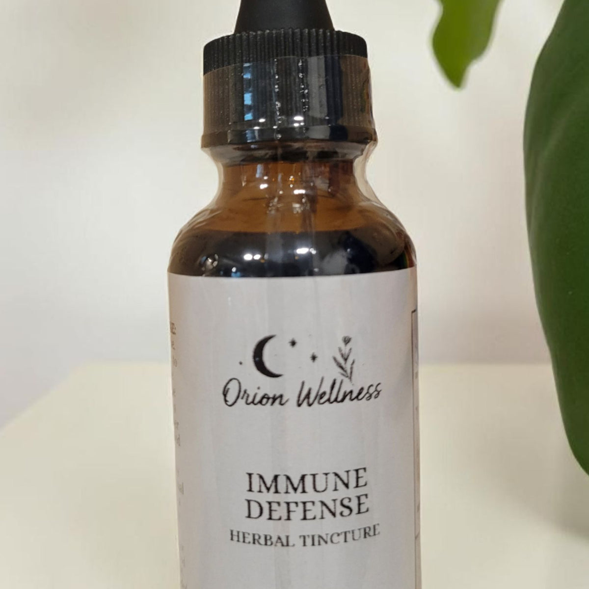 Close-up of Immune Defense label by Orion Wellness