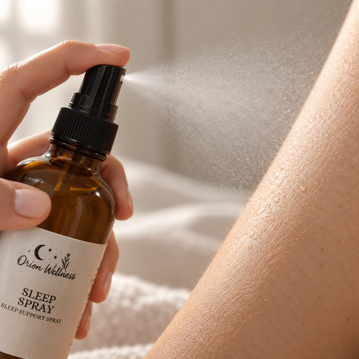 Close-up of the fine mist texture of Orion Wellness Magnesium Sleep Spray