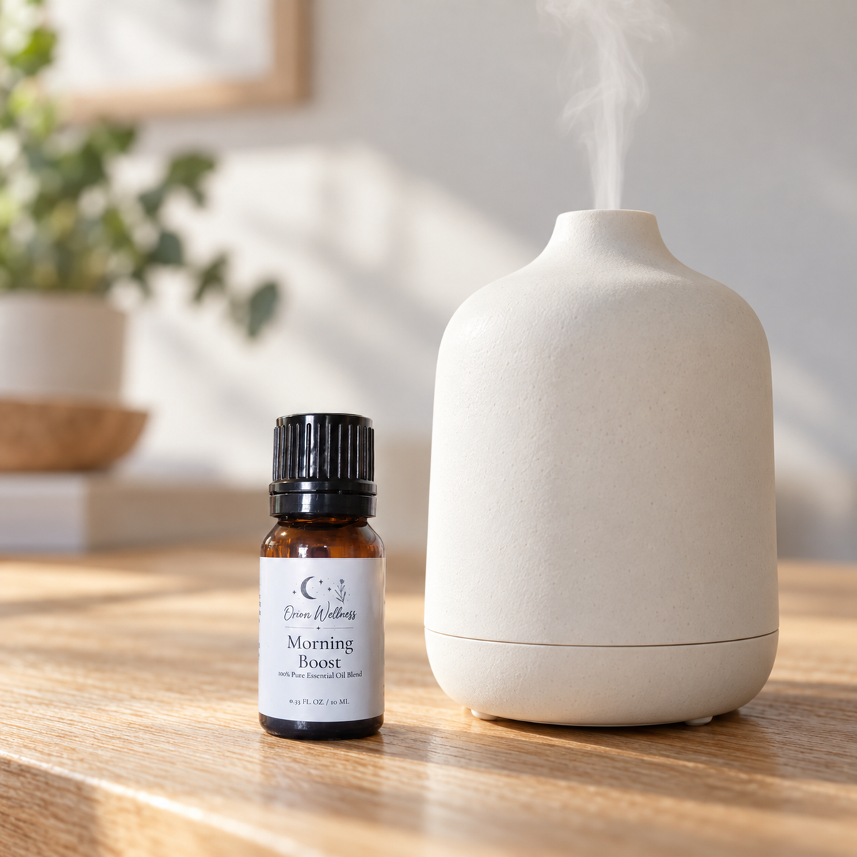 Orion Wellness Morning Boost 10 mL diffuser blend beside a running diffuser
