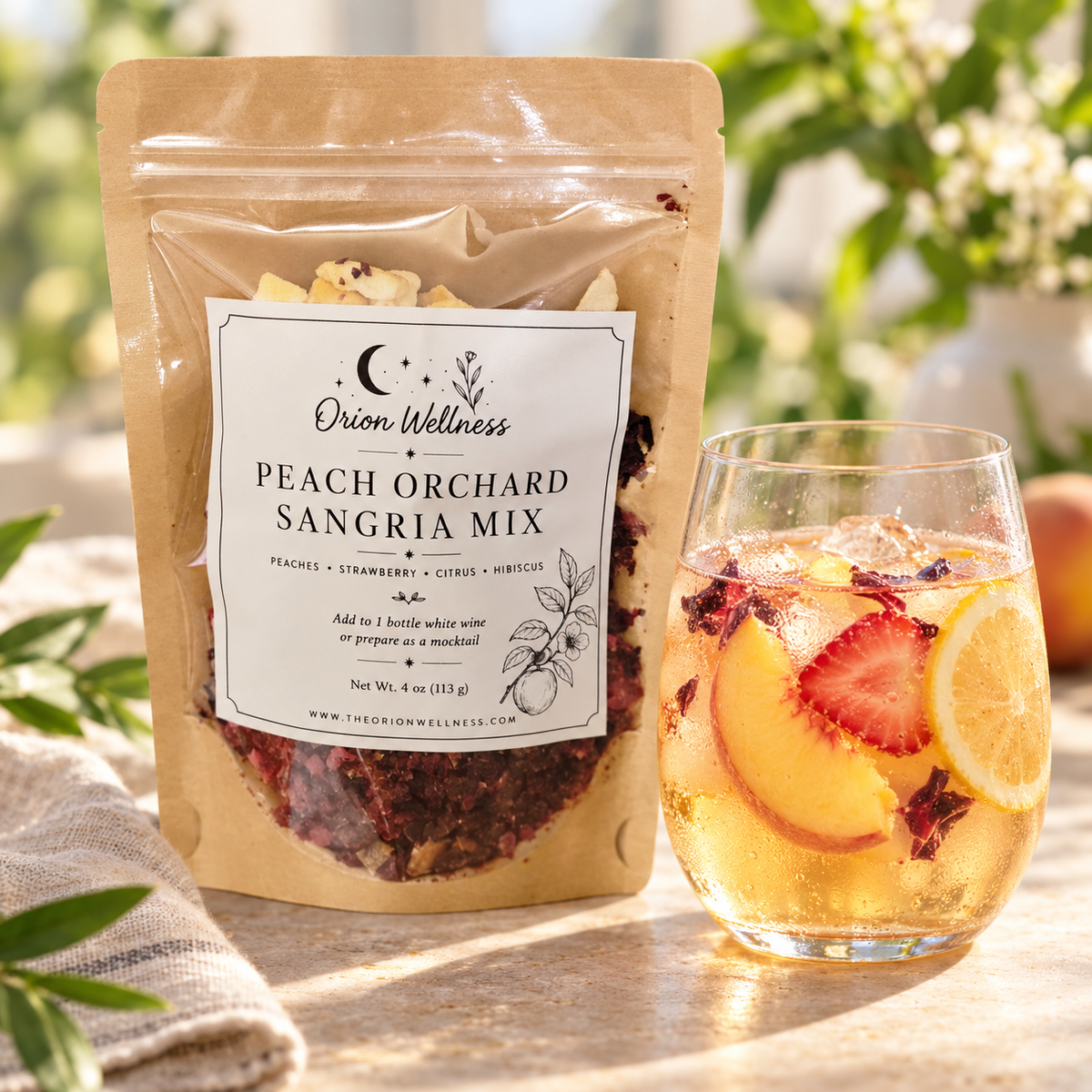 Peach Orchard Sangria Mix beside a prepared peach drink