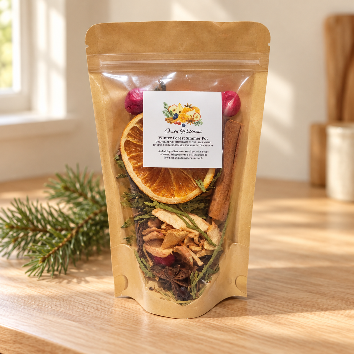 Winter Forest Simmer Pot pouch on a sunlit wooden kitchen counter